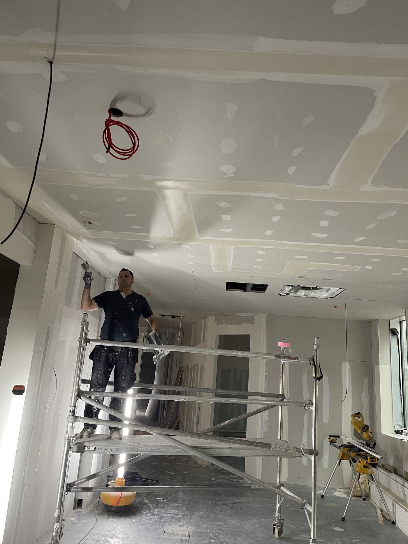 Plasterboard partitions and ceiling boarding on site