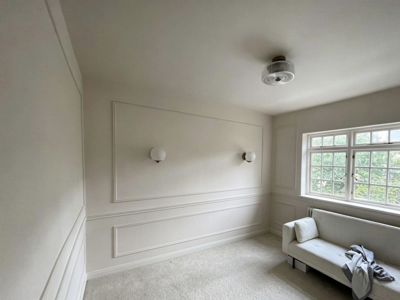 Freshly decorated panelled room with flawless white paintwork by Avex